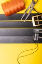 Sewing process of the leather belt. Tools, materials and accessories for leather workshop. Vintage sewing industrial Royalty Free Stock Photo