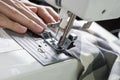 Sewing Process , the sewing machine sew women's hands sewing mac Royalty Free Stock Photo