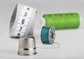 Sewing set from  thimble of colored thread and a centimeter Royalty Free Stock Photo