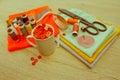 Sewing still life: colorful cloth. scissors and sewing kit includes threads of different colors, thimble and other sewing Royalty Free Stock Photo