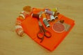 Sewing still life: colorful cloth. scissors and sewing kit inclu Royalty Free Stock Photo