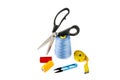 Sewing supplies (thread, scissors and measuring tape) isolated on a white Royalty Free Stock Photo