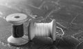 sewing thread on an old wooden spool in vintage style Royalty Free Stock Photo