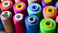 Sewing threads as a multicolored background closeup Royalty Free Stock Photo