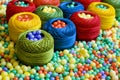 Sewing threads and polystyrene balls Royalty Free Stock Photo