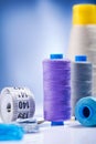 Sewing threads and roll of tape Royalty Free Stock Photo
