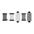 Sewing threads on spools set. Black isolated on white background spool thread icons. Royalty Free Stock Photo