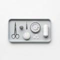 Include silver scissors a thimble a seam ripper a pinwheel and a spool of Royalty Free Stock Photo