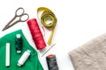 Sewing tools, fabric and kit for hobby collection on white background top view mock-up Royalty Free Stock Photo