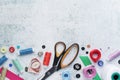 Sewing tools forming background with copy space Royalty Free Stock Photo