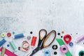 Sewing tools forming background with copy space Royalty Free Stock Photo