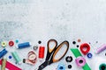 Sewing tools forming background with copy space Royalty Free Stock Photo