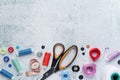 Sewing tools forming background with copy space Royalty Free Stock Photo