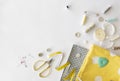 Sewing tools frame. A tools set for sewing on a white table. Top view with copy space Royalty Free Stock Photo