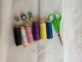 Sewing tools set thread needles button Royalty Free Stock Photo