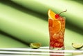 Sex on the beach alcoholic cocktail drink with vodka, peach liqueur, orange and cranberry juice, lemon and ice with red cherry. Royalty Free Stock Photo