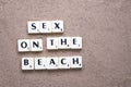 Sex on the beach letters in sand Royalty Free Stock Photo