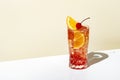 Sex on the beach - popular alcoholic cocktail drink with vodka, peach liqueur, orange and cranberry juice, lemon and ice, Royalty Free Stock Photo