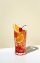 Sex on the beach - popular alcoholic cocktail drink with vodka, peach liqueur, orange and cranberry juice, lemon and ice, Royalty Free Stock Photo