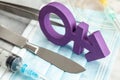 Sex-change operation. Transgender symbol and scalpel with a syringe. Surgical Instruments Royalty Free Stock Photo