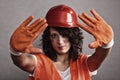 girl in safety helmet showing stop sign Royalty Free Stock Photo
