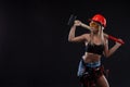 Sex equality and feminism. girl in safety helmet holding hammer tool. Attractive woman working as construction worker. Royalty Free Stock Photo