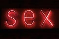 SEX hot red neon on black background Royalty Free Stock Photo