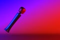 Sex vibrator. Massager for intimate games, masturbation. Levitation. Shiny device on a gradient red and blue background. 3D render