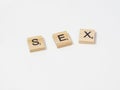 Sex word written with wooden blocks isolated Royalty Free Stock Photo