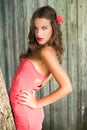 Sexi beautiful young lady in red over grey Royalty Free Stock Photo