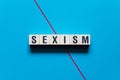 Sexism word concept on cubes