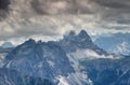 Sexten Dolomites in dark clouds with Drei Zinnen Tre Cime peaks Royalty Free Stock Photo