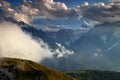 Sesto valley, Dolomites and Tre Cime in sunlit clouds at sunset Royalty Free Stock Photo