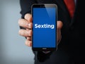 Sexting businessman smartphone