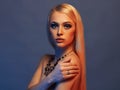 Sexual beautiful blonde woman in jewelry Royalty Free Stock Photo