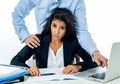 Sexual harassment at work. Disgusted employee being molested by her boss Royalty Free Stock Photo