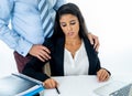 Sexual harassment at work. Disgusted employee being molested by her boss Royalty Free Stock Photo