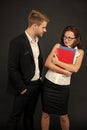 Sexual harassment in workplace. Male employee harass female colleague. Workplace harassment