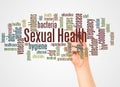 Sexual Health word cloud and hand with marker concept