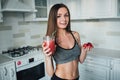 Sexual sports girl drinking a delicious smoothie with berries Royalty Free Stock Photo