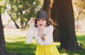 Sexual woman in hat, beckoning gesture, outdoors. Royalty Free Stock Photo