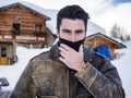 Sexual young man covered with scarf Royalty Free Stock Photo