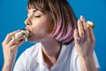 Attractive woman eating piece of pie