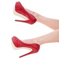 bare female legs in elegant red stilettos Royalty Free Stock Photo