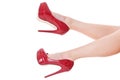 bare female legs in elegant red stilettos Royalty Free Stock Photo