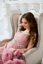 Sexy beatifull pregnant woman at pink dress Royalty Free Stock Photo