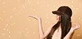 Sexy beautiful brunette woman in a brown suede baseball cap Royalty Free Stock Photo