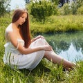 beautiful girl near the water