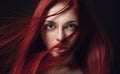 beautiful redhead girl with long hair. Perfect woman portrait on black background. Gorgeous hair and deep big blue eyes