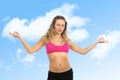 beautiful woman with blond hair and sport clothes doing lotus hands yoga pose in top bra Royalty Free Stock Photo